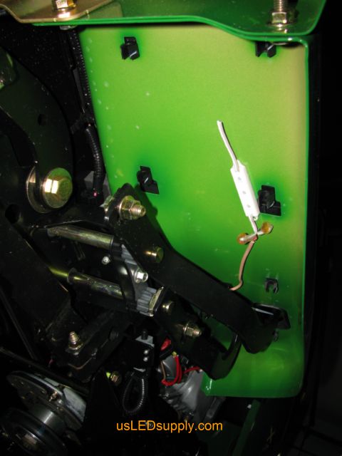 The green LED module is a SMD and can be seen here attached to the underside of the John Deere tractor.