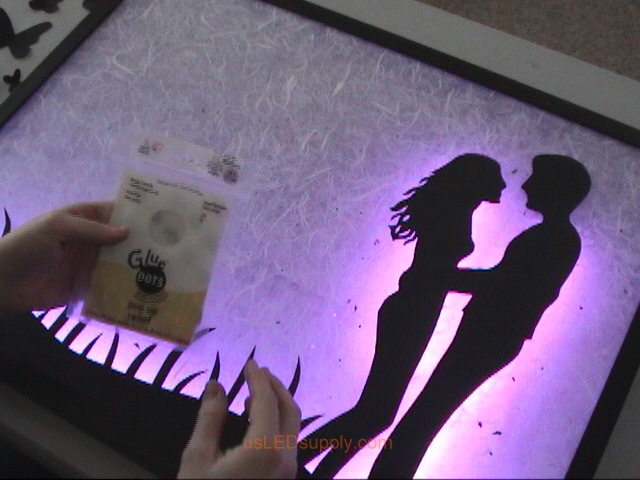 Attach additional silhouette pieces with glue dots or pop up relief adhesive.