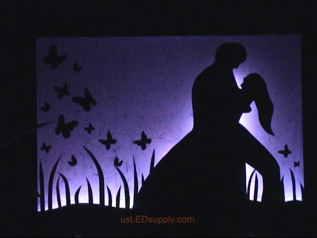 RGB LED silhouette art project with couple in love.