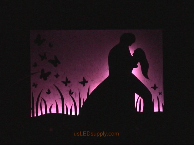 RGB LED silhouette art project with couple in love.