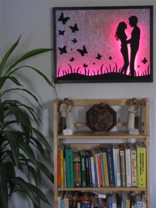 LED Silhouette Art set aglow with color Changing RGB LED Lights.