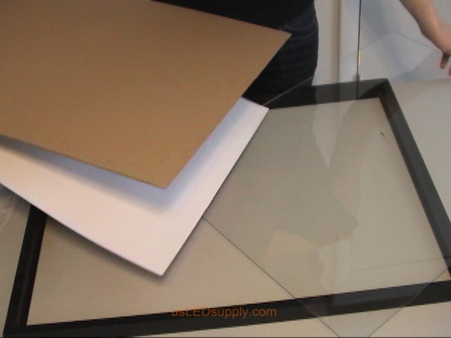 Separate the glass from the paper/cardboard.