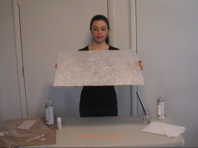 Transluscent mulberry paper is now covering the entire piece of glass.