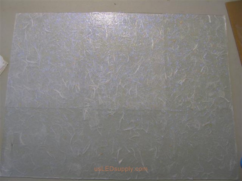 Cover the white paper with diamond glitter paint- this gives it a nice effect in the daytime (at night you don't notice this).