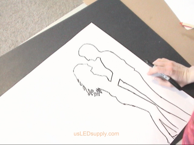 Draw focal point of your silhouette, in this case it was the silhouette of a couple in love.