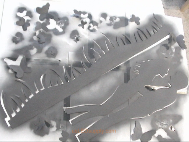 Paint the silhouette pieces with black paint (spray, acrylic...whatever you want).
