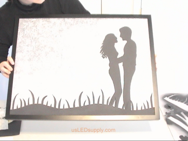 Put glass back in frame and set face down on the table.