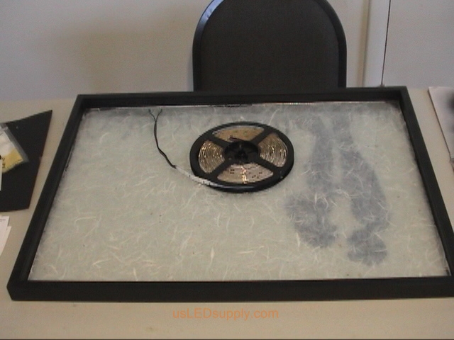 Cutting RGB Flexible LED Strip to light up silhouette art project.