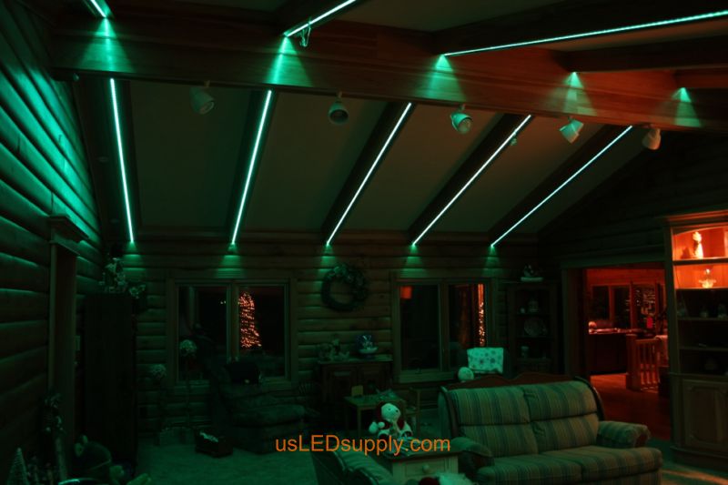 Livingroom with RGB Flexible LED Strips set on teal green color