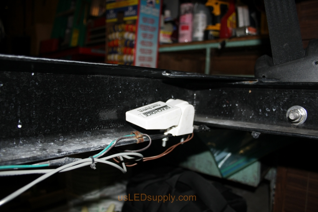 Float switch is wired to blue lead of the RGB LEDs, causing the pylons to change to blue when the trailer is backed into the water.