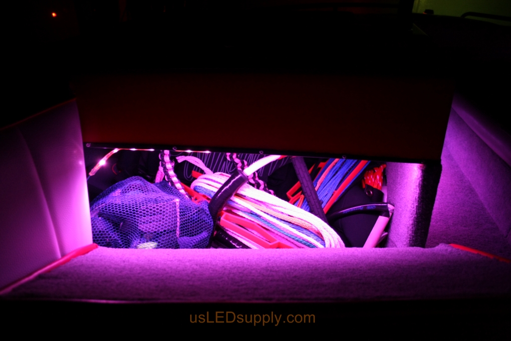 RGB LED lights inside a storage compartment on a malibu sunsetter makes it easy to find your stuff.