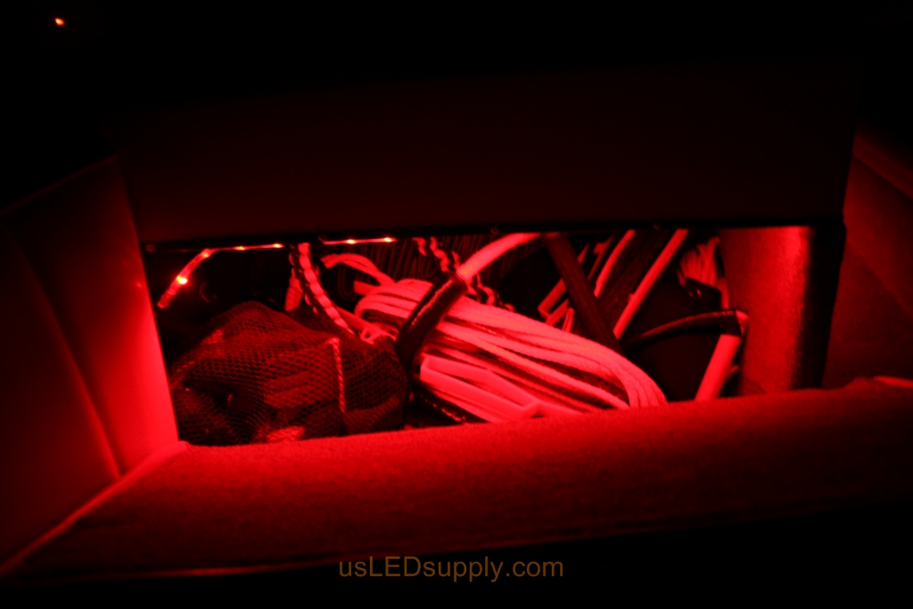 RGB LED lights inside a storage compartment on a malibu sunsetter makes it easy to find your stuff.