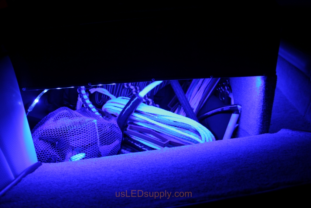 RGB LED lights inside a storage compartment on a malibu sunsetter makes it easy to find your stuff.
