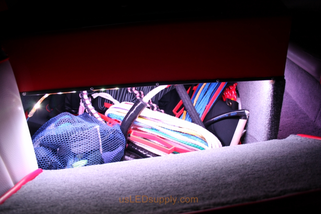 RGB LED lights inside a storage compartment on a malibu sunsetter makes it easy to find your stuff.