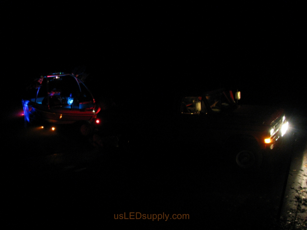 Truck trailer and boat ready to pull out of the river.