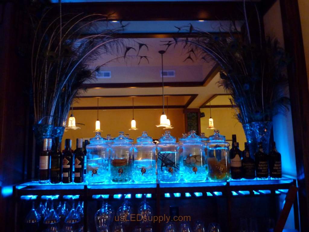 Oregon Bar wtih Color changing RGB Flexible LED Strips lighting up the glass bar shelving for a bright and dynamic effect.