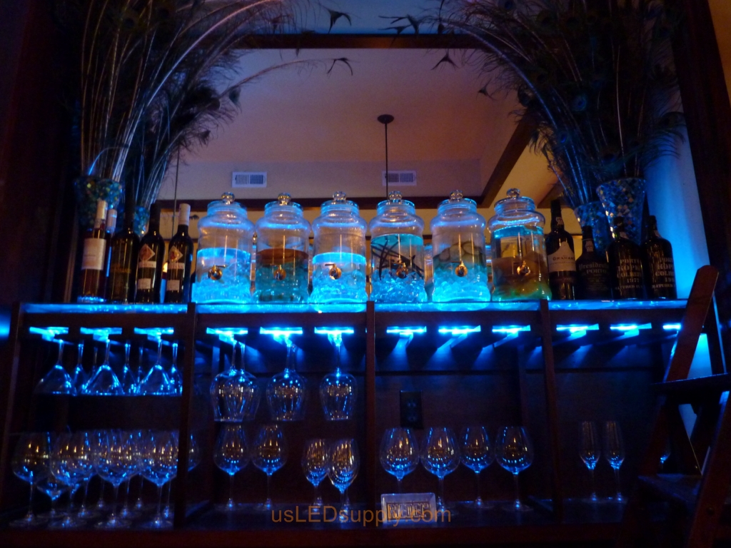 Oregon Bar wtih Color changing RGB Flexible LED Strips lighting up the glass bar shelving for a bright and dynamic effect.