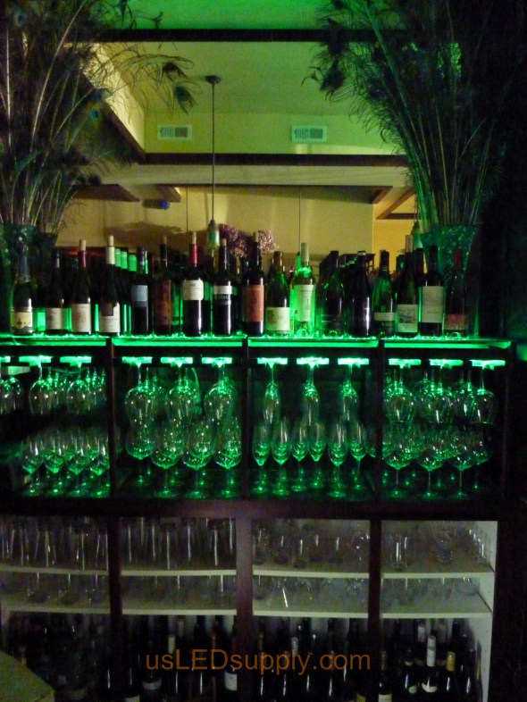 Oregon Bar wtih Color changing RGB Flexible LED Strips lighting up the glass bar shelving for a bright and dynamic effect.