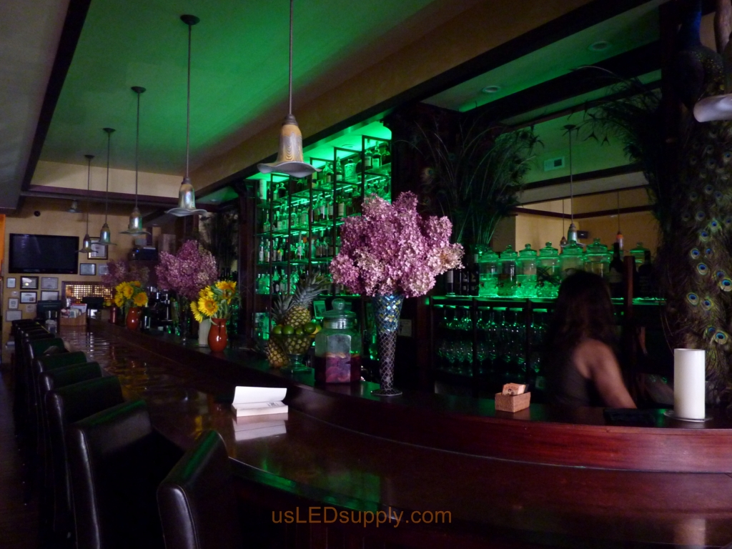 Oregon Bar wtih Color changing RGB Flexible LED Strips lighting up the glass bar shelving for a bright and dynamic effect.