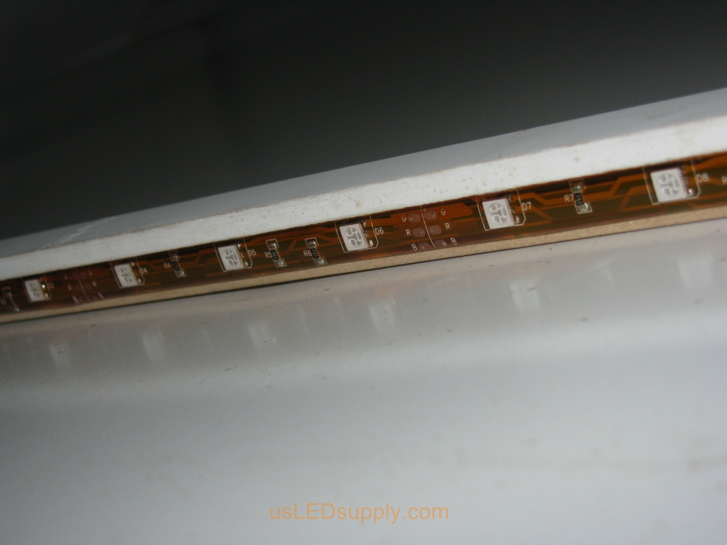 RGB Flexible LED strip installed in the groove under the chair rail.