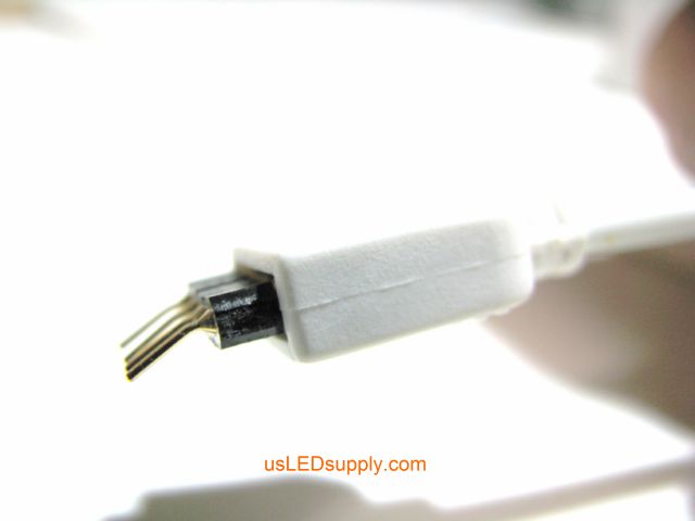 4 pin connector with pins bent slightly, so that the bottom of the IR connector will be flush with the bottom of the RGB flexible LED strip