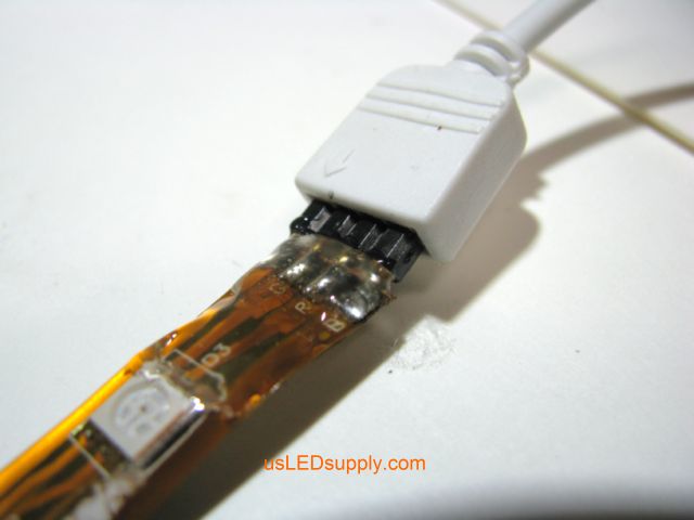 4 Pin connector solder connection covered with hot glue for protection