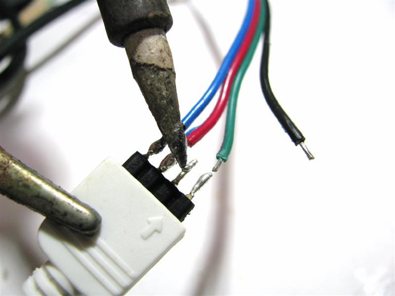 Solder the 4 pins to the stripped wires, keeping the wires in the same order.