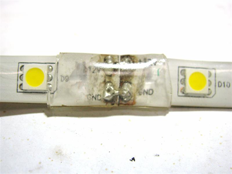 Single color flexible LED strip to strip Solder connection covered with hot glue and heat shrink tubing.