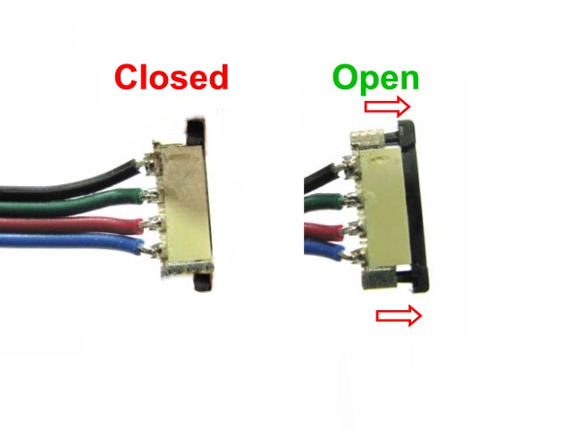 Open splice connector by pulling the black piece outward
