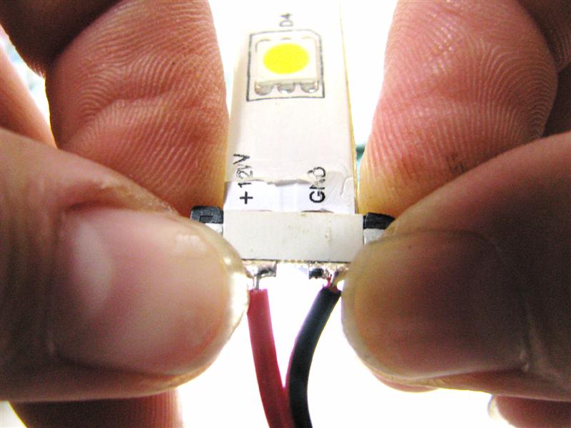 Push black piece of splice connector in to make connection