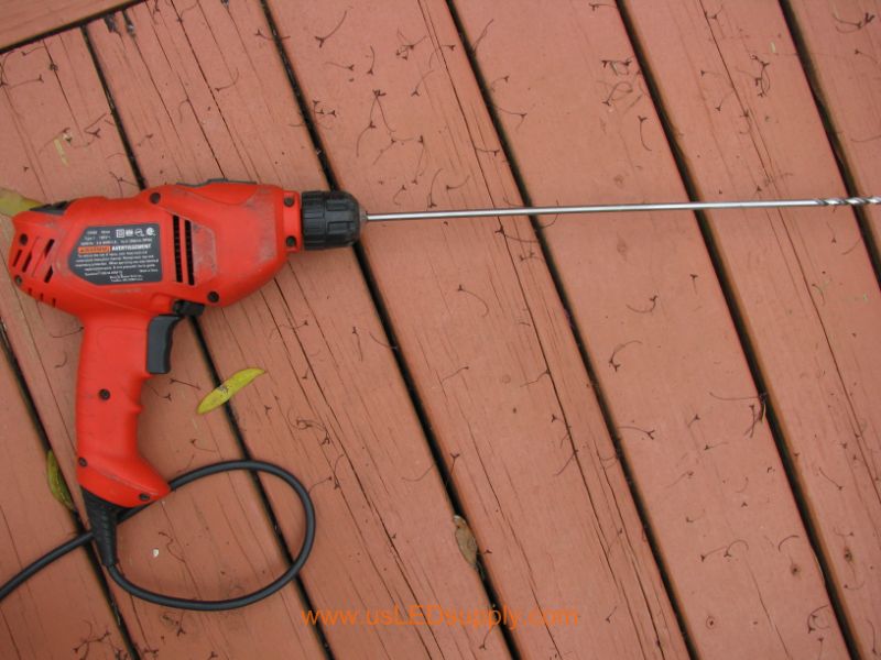 Drill for drilling through deck posts