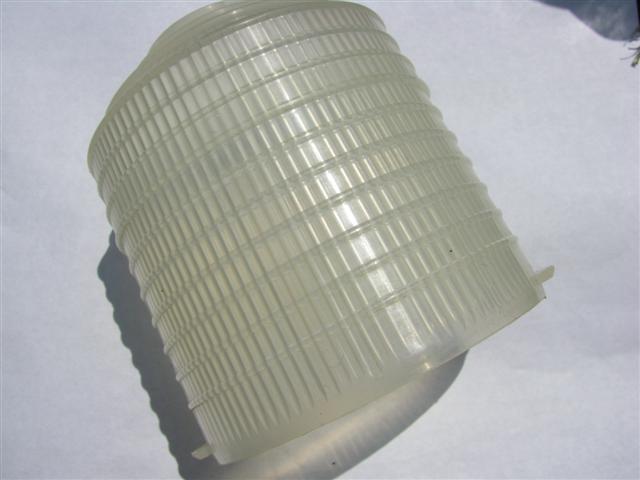 Before putting wires through the bottom of this clear shade, make sure that the bottom trim is on!