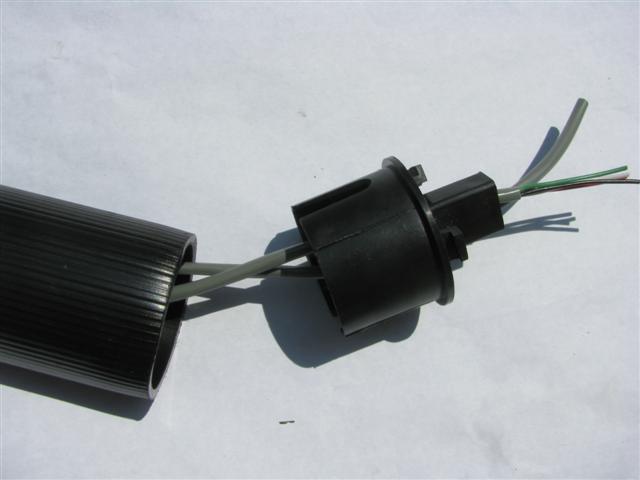 Put the control wires through the bottom connector.