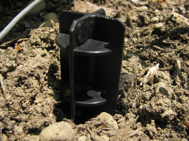 Stake in the ground completely.