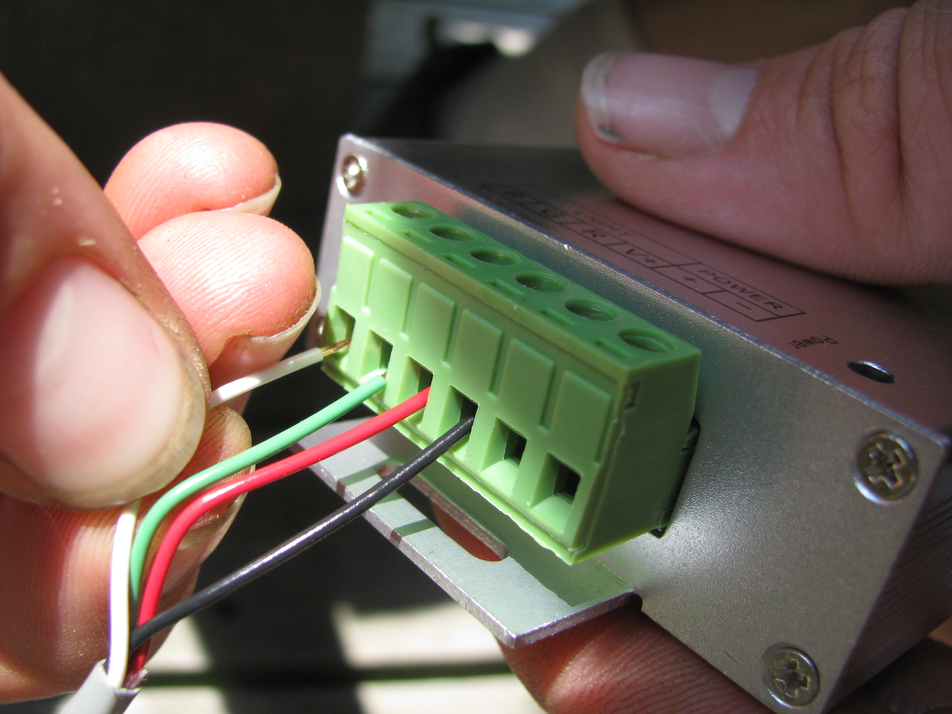 Put wires into correct terminal as indicated on the outside of the controller.