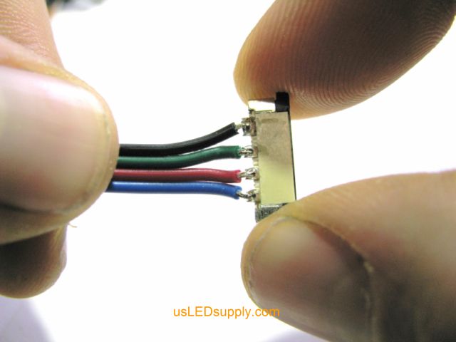 Open splice connector by pulling the black piece outward