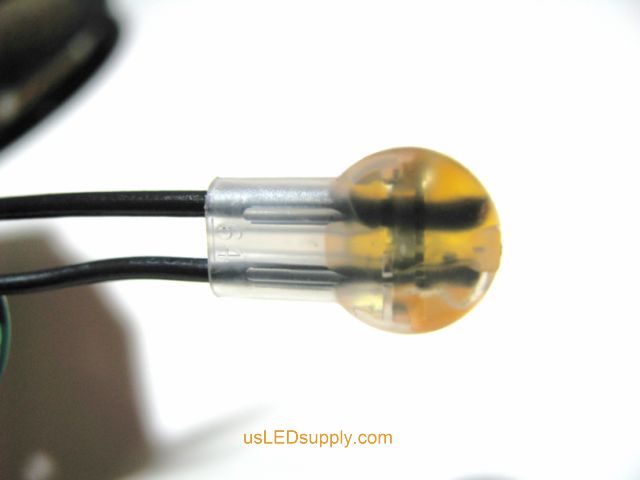 Insert both black wires the entire way into the butt connector.