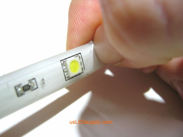 Peel off waterproof coating at the end of the single color flexible LED strip