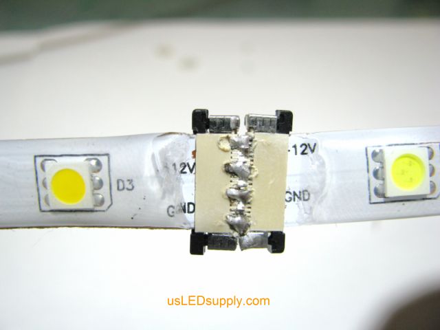 Splice connector connecting two single color flexible LED strips